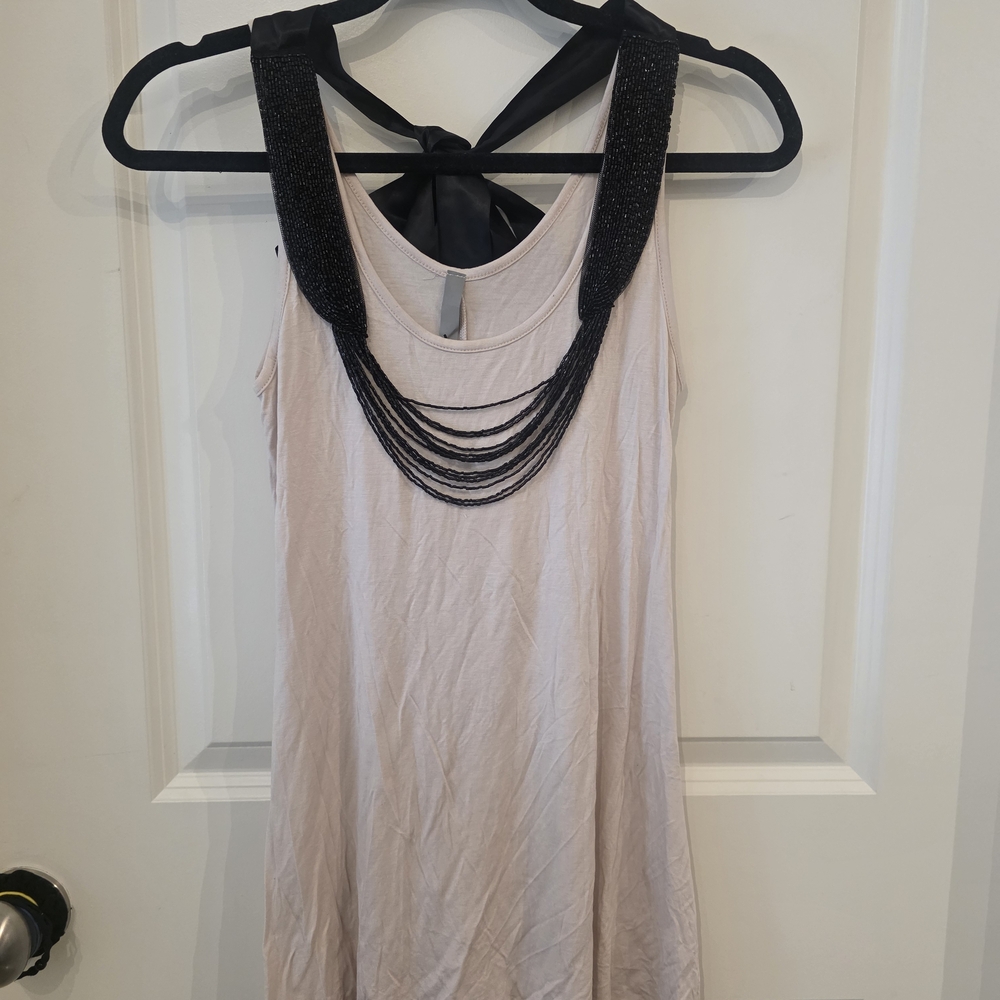 Sleeveless Pink Tank Top with Black Beaded Necklace
